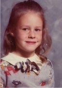 Me in kindergarten. Mom forbade me from wearing my homemade necklace of mussel shells I collected on the beach for picture day, but Ms. Hegg said Go For It!